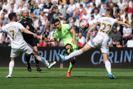 Britain Soccer Football - Swansea City v Manchester City - Barclays Premier League - Liberty Stadium - 15/5/16 Manchester City's Jesus Navas shoots at goal Reuters / Rebecca Naden