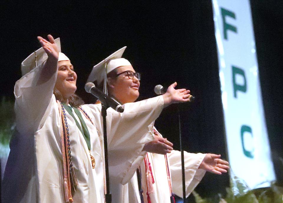 Flagler-Palm Coast High seniors Molly Maresca and Isabella Colindres address the class during commencement exercises, Saturday, May 28, 2022, at the Ocean Center.