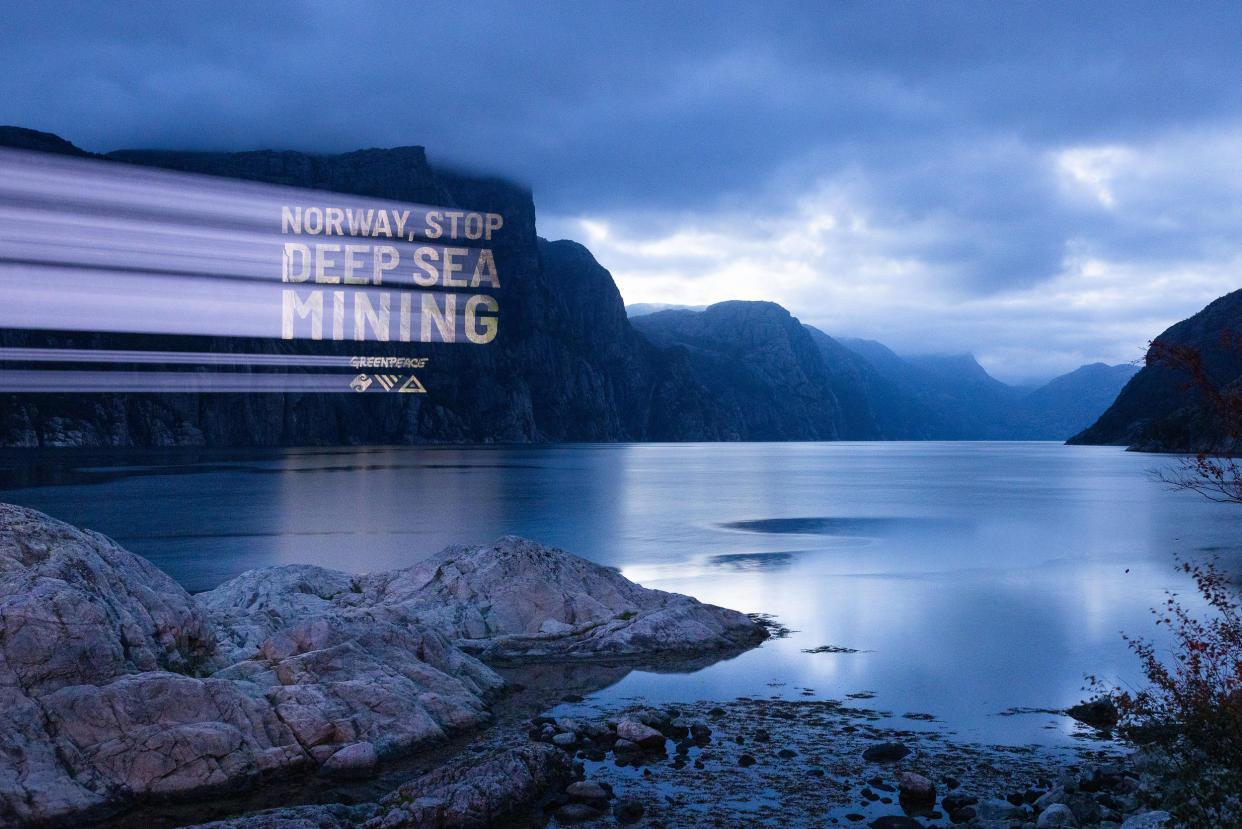 Greenpeace protests with a projection ‘Stop deep-sea mining’ in the Lysefjord in southern Norway (Daniel Muller/PA)