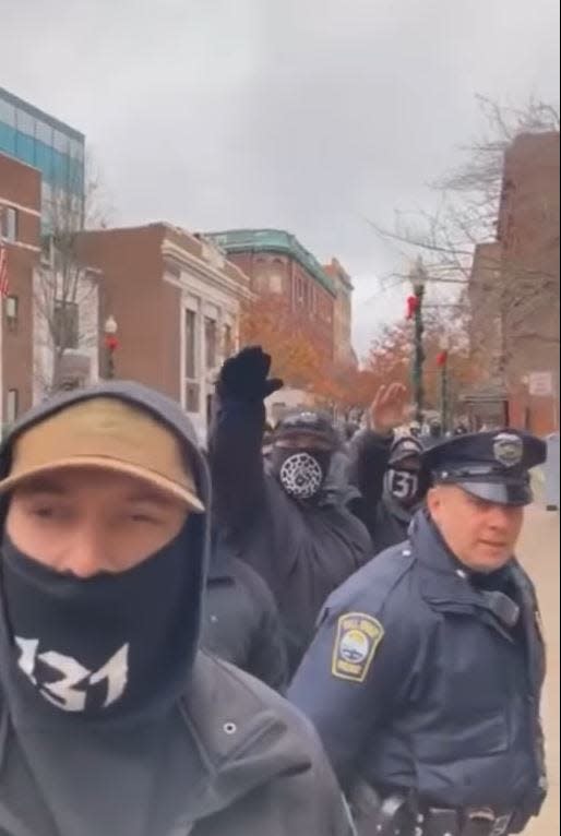 A screengrab of a video posted on Facebook shows neo-Nazis protesting a drag story time at the Fall River Public Library