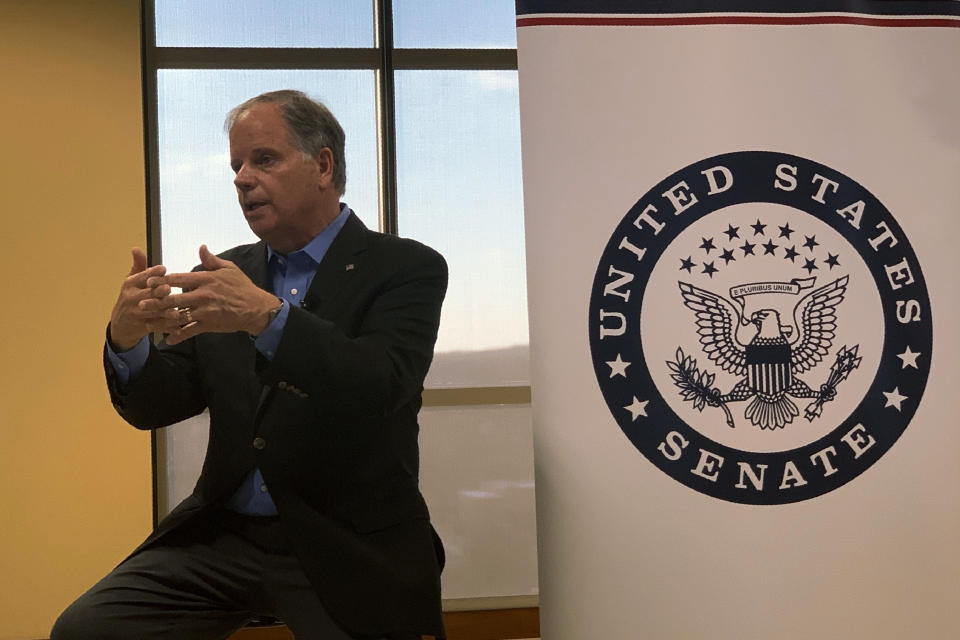 FILE-In this Sept. 30, 2019 file photo, U.S. Sen. Doug Jones addressed the House impeachment inquiry of President Donald Trump during a town hall on the campus of Wallace State Community College in Hanceville, Ala. Jones is often considered the Senate's most vulnerable Democrat in the Nov. 3, 2020, election as Republicans try to recapture the once reliably red state. But he has fielded a well-financed and aggressive campaign as he seeks to hold on to the Deep South seat, outraising Tuberville by a 3-1 margin in the final quarter and approaching Election day with a definitive cash advantage. (AP Photo/Kim Chandler, File)