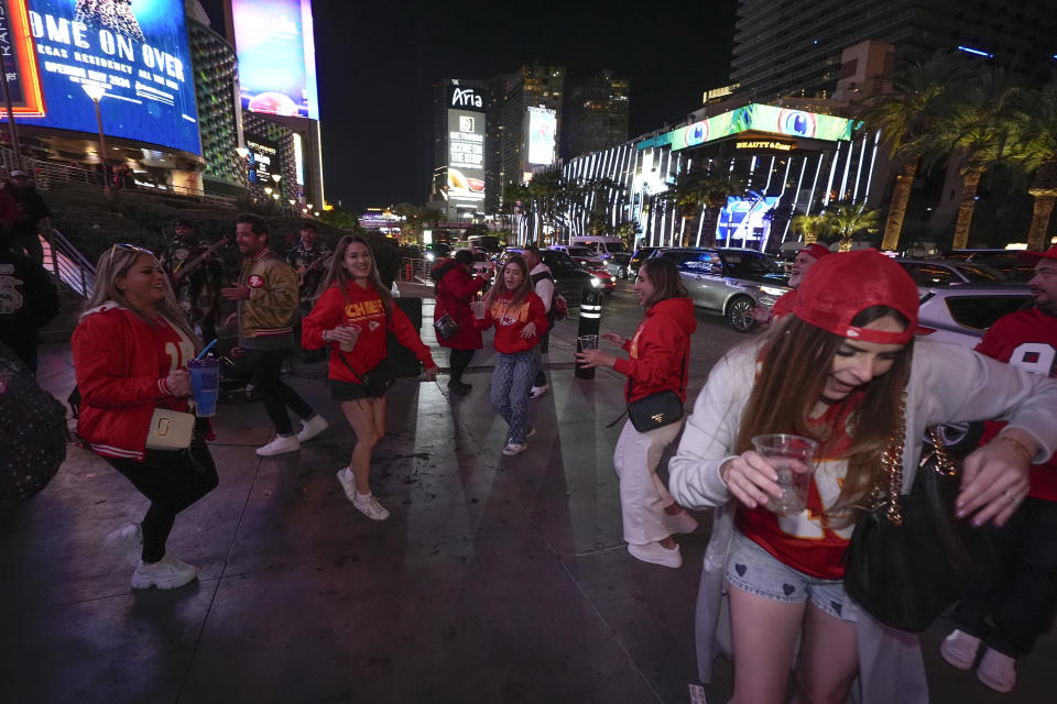 Kansas City Chiefs fans celebrate after the Chiefs defeated the San Francisco 49ers to win the Super Bowl 58 NFL football game, Sunday, Feb. 11, 2024, in Las Vegas. (AP Photo/Gregory Bull)