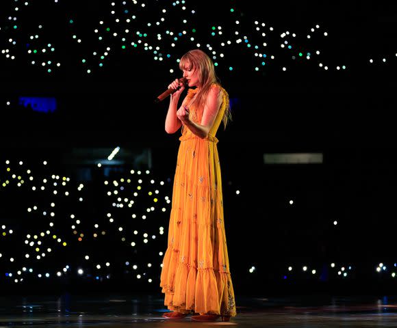 <p>Buda Mendes/TAS23/Getty </p> Taylor Swift performing at the Eras Tour in Brazil on Nov. 17, 2023