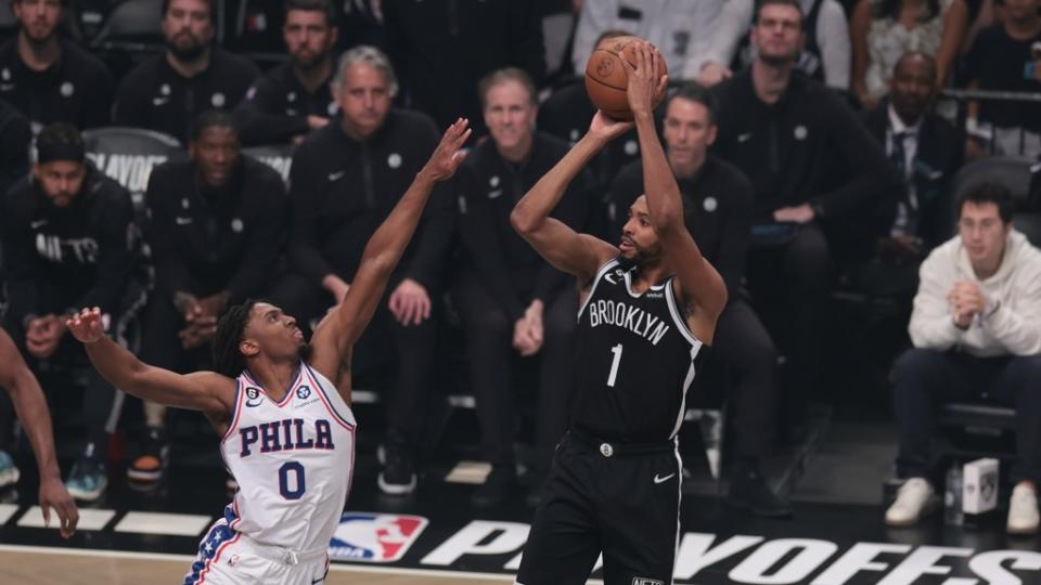 Brooklyn Nets forward Mikal Bridges (1) shoots the ball as Philadelphia 76ers guard Tyrese Maxey (0).