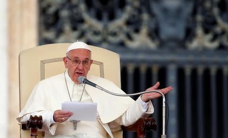 Pope Francis talks during the Wednesday general audience in Saint Peter's square at the Vatican September 7, 2016. REUTERS/Remo Casilli