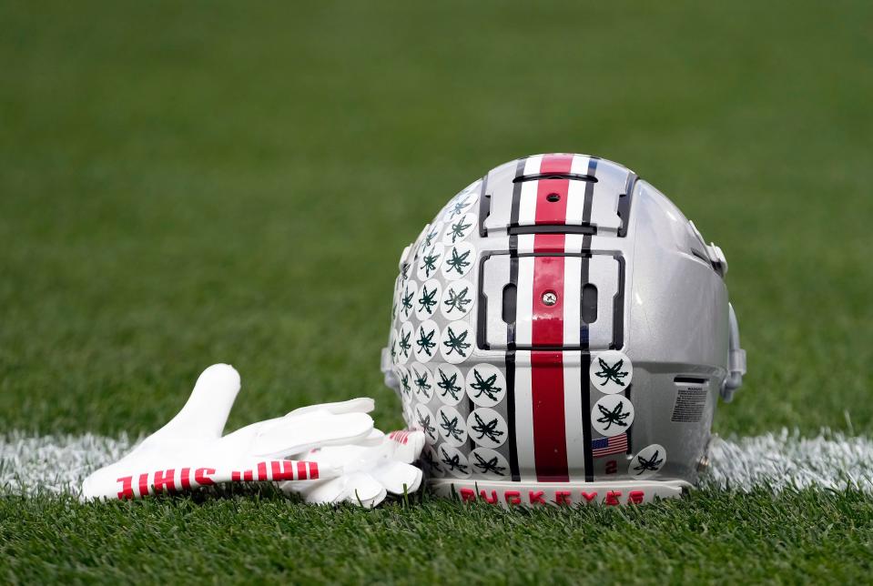 Oct 8, 2022; East Lansing, Michigan, USA; Ohio State Buckeyes wide receiver Emeka Egbuka (2) helmet and gloves during warm-ups before the NCAA Division I football game between the Ohio State Buckeyes and Michigan State Spartans at Spartan Stadium. 