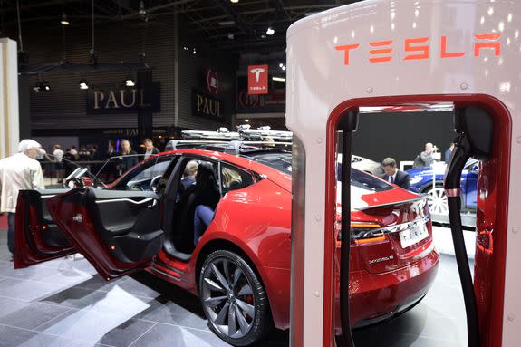 Tesla cars are presented at the Paris Motor Show, Sept. 30, 2016.