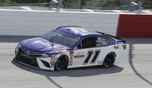 Denny Hamlin Denny drives into Turn 1 during a NASCAR Cup Series auto racing practice session at Darlington Raceway, Friday, Aug. 31, 2018, in Darlington, S.C. (AP Photo/Terry Renna)