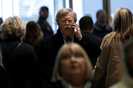 Former U.S. Ambassador to the United Nations John Bolton speaks on a mobile phone as he arrives for a meeting with U.S. President-elect Donald Trump at Trump Tower in New York, U.S., December 2, 2016. REUTERS/Mike Segar