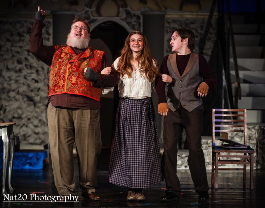 Chris Tracy, left, Claire Sattler and Caleb Swinney in “Anastasia.”