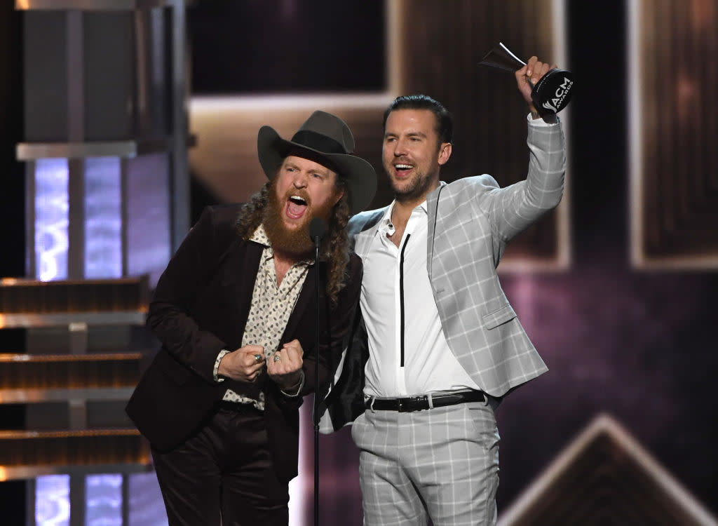 John and T.J. Osborne, of Brothers Osborne, accept the Vocal Duo of the Year award, during the 52nd Academy of Country Music Awards on April 2, 2017. (Photo: Ethan Miller/Getty Images)
