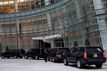 The motorcade of Republican presidential candidate Donald Trump stands outside the Le Cirque restaurant during a fundraising event in Manhattan, New York City, U.S., June 21, 2016. REUTERS/Mike Segar