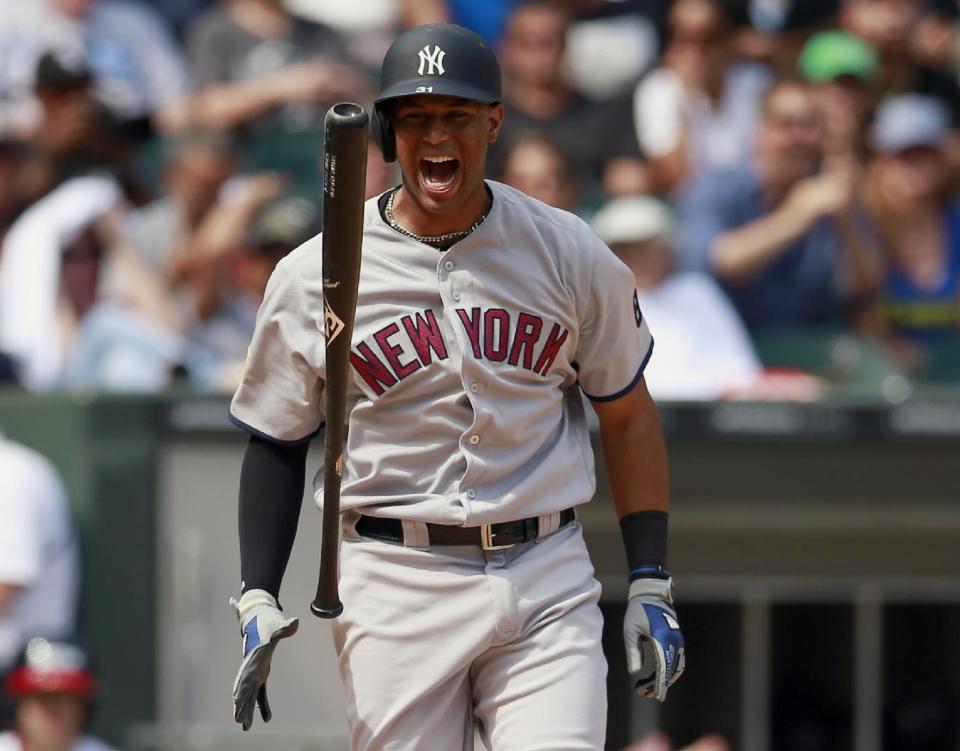 FILE - In this July 4, 2016, file photo, New York Yankees Aaron Hicks reacts to striking out in the eight inning of a baseball game against the Chicago White Sox in Chicago. The White Sox defeated the Yankees 8-2. New York played the day before in San Diego. Researchers say they’ve documented an unseen drag on major league baseball players that can wipe out home field advantage, make pitchers give up more home runs, and take some punch out of a team's bats. The culprit: jet lag. (AP Photo/Jeff Haynes, File)