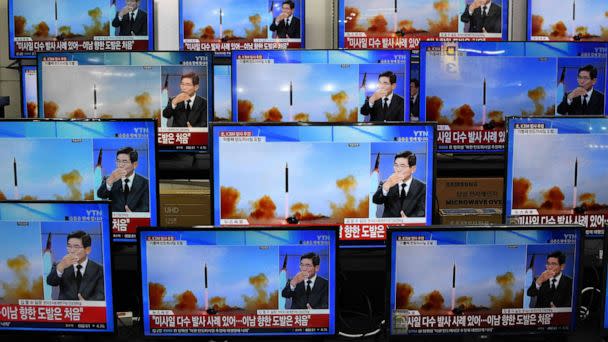 PHOTO: Television screens show a news report about the latest North Korean missile launch with file footage of a North Korean missile test, at an electronic market in Seoul on Nov. 3, 2022. (Jung Yeon-je/AFP via Getty Images)