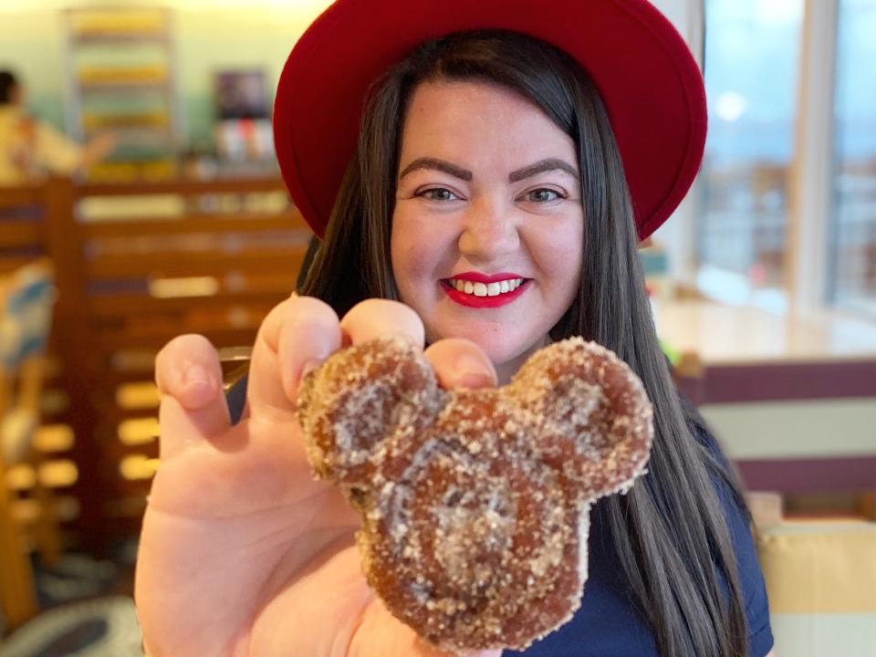 megan holding mickey mouse shaped waffle