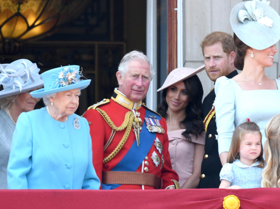 LONDON, ENGLAND - JUNE 09:  Queen Elizabeth II, Prince Charles, Prince of Wales, Meghan, Duchess of Sussex, Prince Harry, Duke of Sussex, Catherine, Duchess of Cambridge and Princess Charlotte of Cambridge on the balcony of Buckingham Palace during Trooping The Colour 2018 at The Mall on June 9, 2018 in London, England. The annual ceremony involving over 1400 guardsmen and cavalry, is believed to have first been performed during the reign of King Charles II. The parade marks the official birthday of the Sovereign, even though the Queen's actual birthday is on April 21st.  (Photo by Karwai Tang/WireImage)