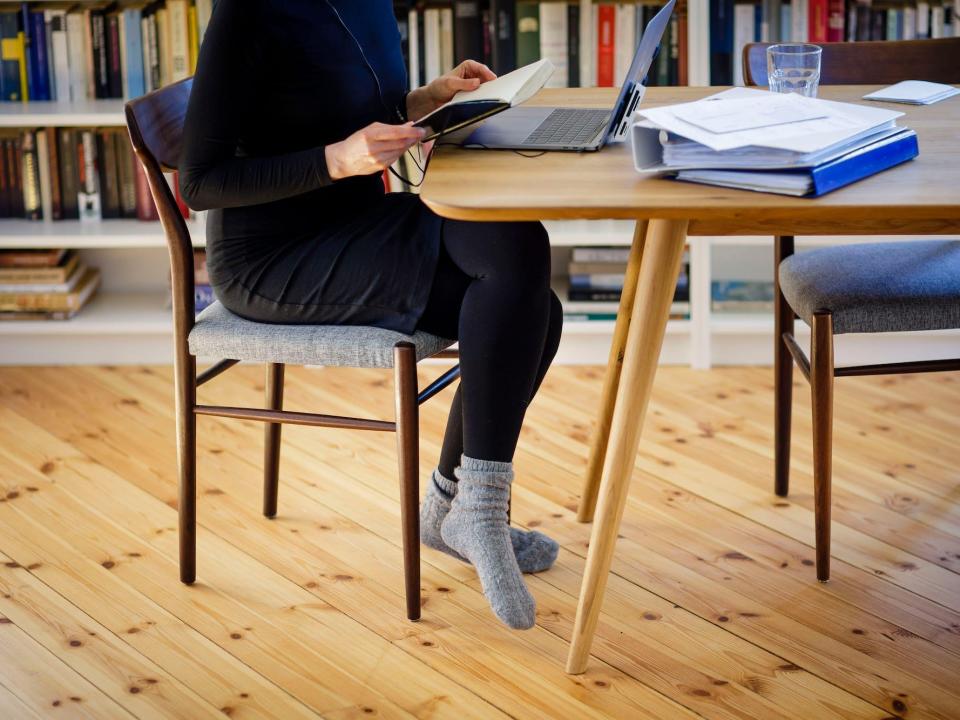 a woman in her home office desk