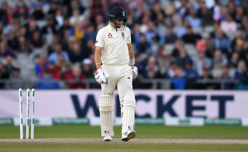 MANCHESTER, ENGLAND - SEPTEMBER 07: England captain Joe Root is bowled by Pat Cummins of Australia during day four of the 4th Specsavers Ashes Test match between England and Australia at Old Trafford on September 07, 2019 in Manchester, England. (Photo by Gareth Copley/Getty Images)