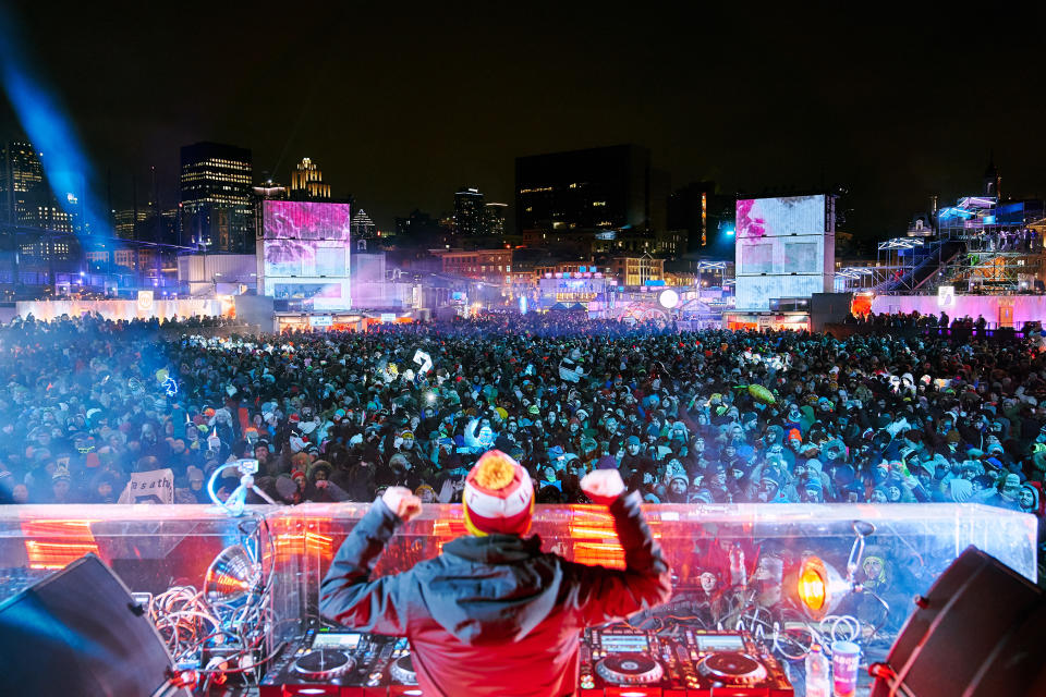 View from behind the DJ at Igloofest in Montreal, winter EDM festival