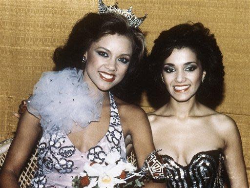 Vanessa Williams, left, is shown after being crowned Miss America 1984 in Atlantic City, N.J. on Sept. 17, 1983. Suzette Charles, right, another black woman, was chosen as first runner-up.
