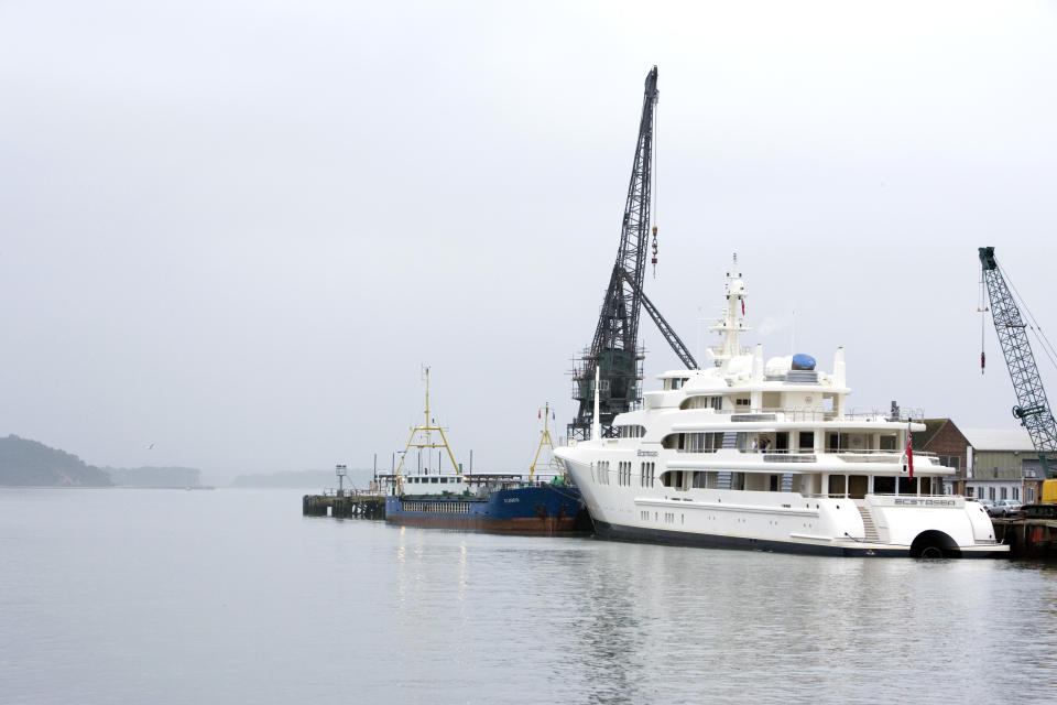 POOLE HARBOUR, ENGLAND - FEBRUARY 01:  The 86 metre super-yacht named 'Ecstasea', owned by Russian businessman and owner of Chelsea Football Club, Roman Abramovich, is moored at Poole Harbour on the evening of February 1, 2007 in Dorset, England. Ecstasea has arrived from the Azores and is bound for Hamburg, Germany. She is one of the most powerful super-yachts in the world, boasting 4 x 3,154hp diesel engines and 1 x 31,269hp gas turbine waterjet.  (Photo by Mike Jones/Kos Picture Source via Getty Images)