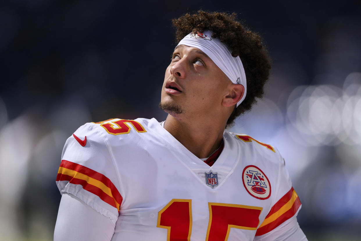 Kansas City Chiefs quarterback Patrick Mahomes (15) warms up on the field before an NFL football game against the Indianapolis Colts, Sunday, Sept. 25, 2022, in Indianapolis. (AP Photo/Zach Bolinger)