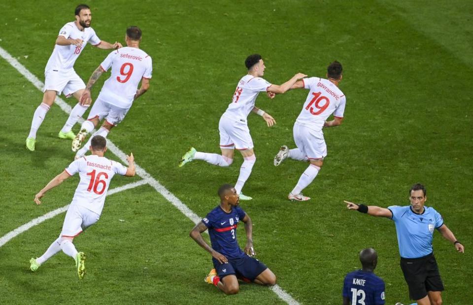 Mario Gavranovic celebrates his late equaliser for Switzerland, who came from 3-1 down to force extra time.