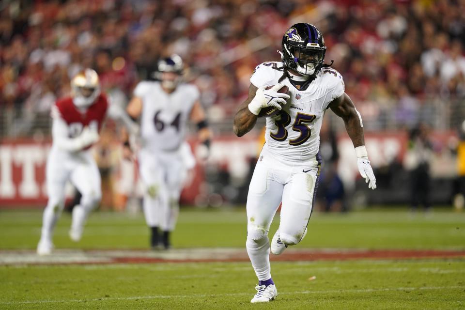 Dec 25, 2023; Santa Clara, California, USA; Baltimore Ravens running back Gus Edwards (35) runs the ball against the San Francisco 49ers in the third quarter at Levi’s Stadium. Mandatory Credit: Cary Edmondson-USA TODAY Sports