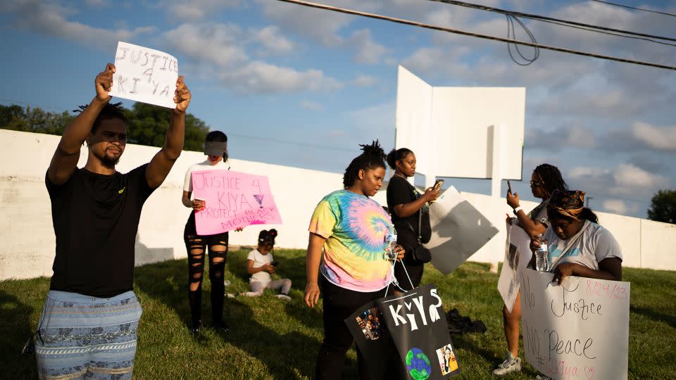 Friends, family and activists at an August 25 protest of the shooting of Ta'Kiya Young. - Courtney Hergesheimer/The Columbus Dispatch/AP