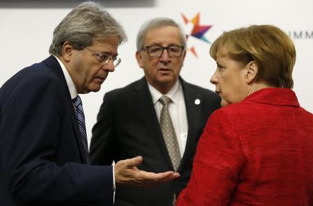 German Chancellor Angela Merkel speaks with EU Commision President Jean-Claude Juncker (C) and Italian Prime Minister Paolo Gentiloni at the European Union leaders summit in Malta, February 3, 2017. REUTERS/Darren Zammit-Lupi