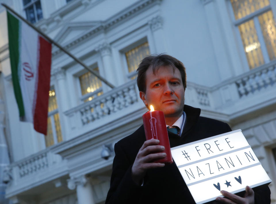 FILE - In this Jan. 16, 2017 file photo, Richard Ratcliffe, husband of imprisoned charity worker Nazanin Zaghari-Ratcliffe, poses for the media during a vigil outside the Iranian Embassy in London. Richard Ratcliffe said Saturday June 15, 2019, that Nazanin Zaghari-Ratlciffe had told Iranian judicial officials that she will refuse food but will drink water until she is granted “unconditional release.” (AP Photo/Alastair Grant, File)