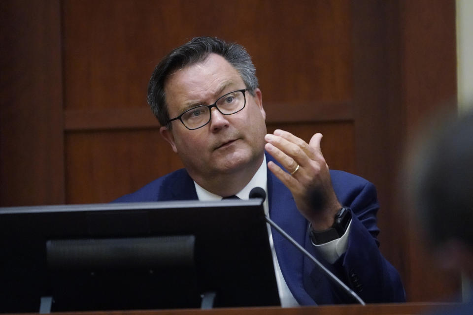 Dr. Richard Moore, Jr., testifies in the courtroom at the Fairfax County Circuit Courthouse in Fairfax, Va., Monday, May 23, 2022. Actor Johnny Depp sued his ex-wife Amber Heard for libel in Fairfax County Circuit Court after she wrote an op-ed piece in The Washington Post in 2018 referring to herself as a "public figure representing domestic abuse." (AP Photo/Steve Helber, Pool)