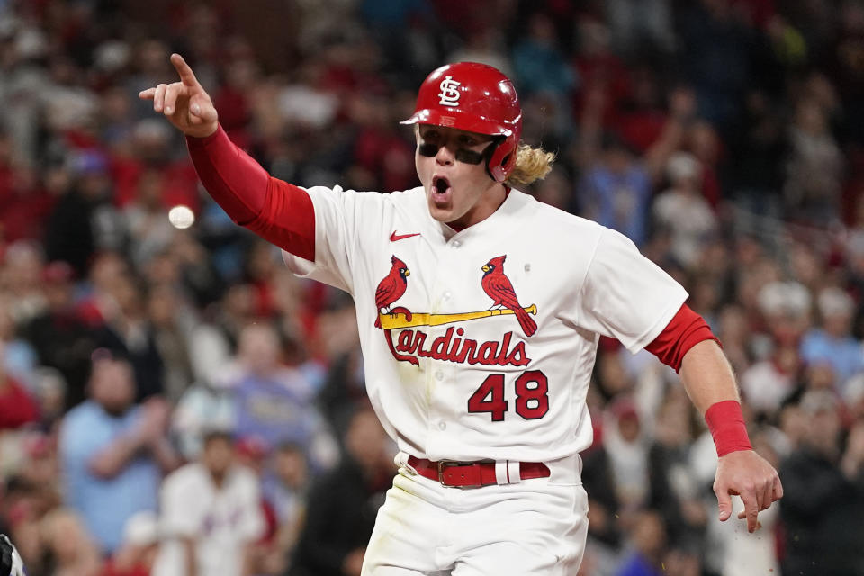 St. Louis Cardinals' Harrison Bader (48) celebrates as he scores during the eighth inning of a baseball game against the New York Mets Monday, April 25, 2022, in St. Louis. (AP Photo/Jeff Roberson)