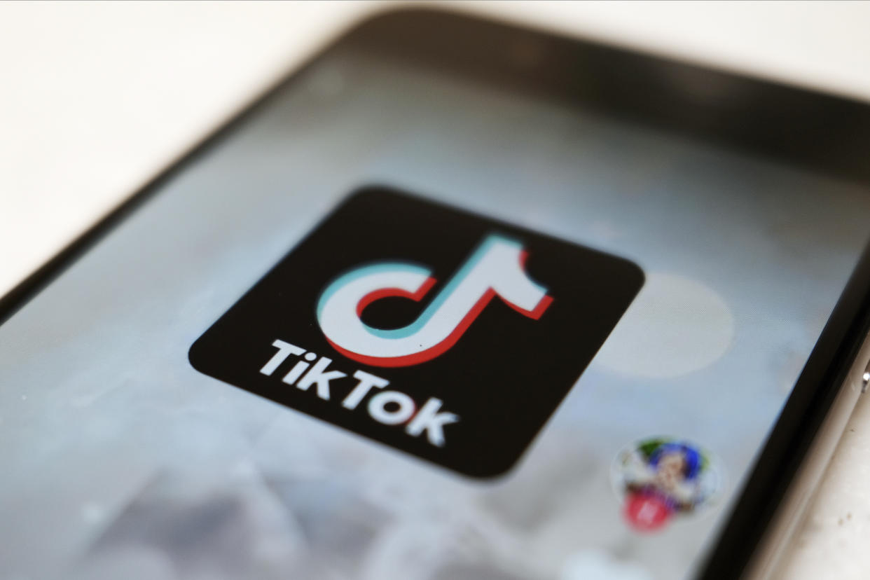 work FILE - This Sept. 28, 2020, file photo, shows a TikTok logo on a smartphone screen in Tokyo. After months of testing, TikTok is fully launching its e-commerce product in the U.S., in an effort to translate the app’s cultural relevance among young consumers to sales. The company said Tuesday, Sept. 12, 2023 its shopping wing, called TikTok Shop, will include several features such as a “Shop Tab,” a marketplace its been testing on the app since August. (AP Photo/Kiichiro Sato, File)