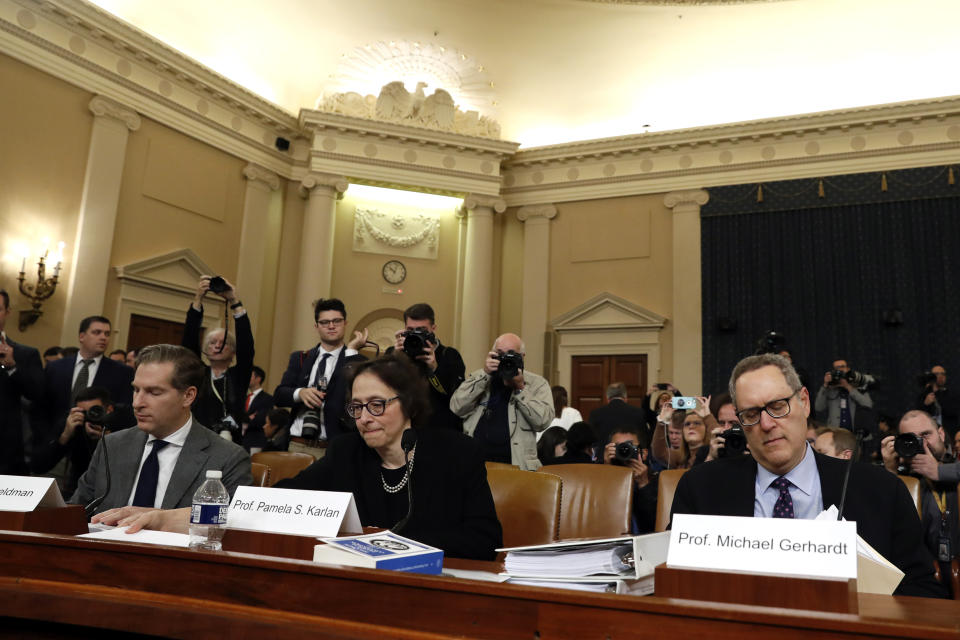 Constitutional law experts, from left, Harvard Law School professor Noah Feldman, Stanford Law School professor Pamela Karlan and University of North Carolina Law School professor Michael Gerhardt arrive to testify during a hearing before the House Judiciary Committee on the constitutional grounds for the impeachment of President Donald Trump, Wednesday, Dec. 4, 2019, on Capitol Hill in Washington. (AP Photo/Jacquelyn Martin)