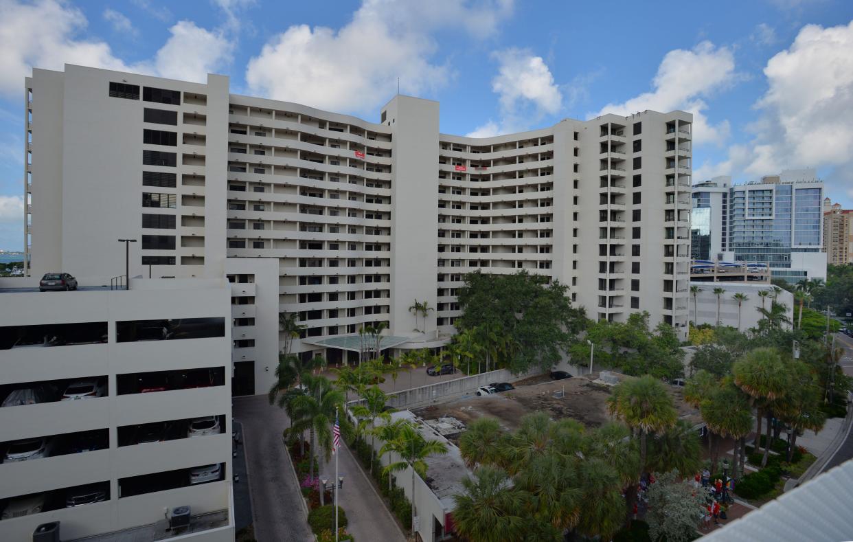 This file photo shows the Bay Plaza Condo tower and lot where Obsidian Residences plans to build what still would be the tallest residential building in downtown Sarasota. A state law passed after Hurricane Ian to prevent more restrictive regulation has blocked a City Commission change from 2023 that regulated uninhabitable space between floors in buildings.