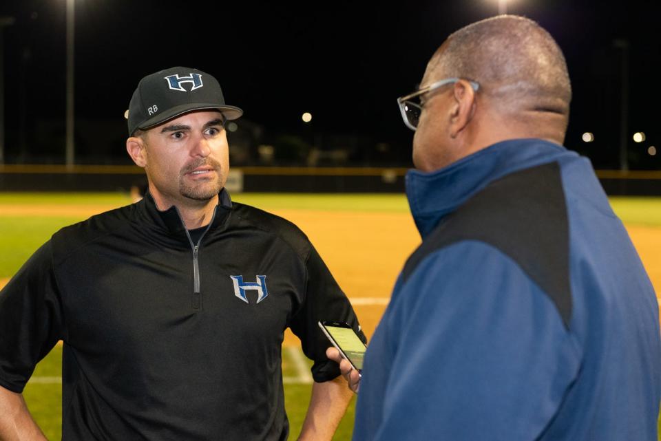 Hendrickson's Doug Pearce, conducting a postgame interview after a baseball game in 2019, has been promoted to the head football coach and campus boys athletic coordinator position. Pearce replaces Chip Killian, who resigned in June after 16 years as Hendrickson's head football coach.