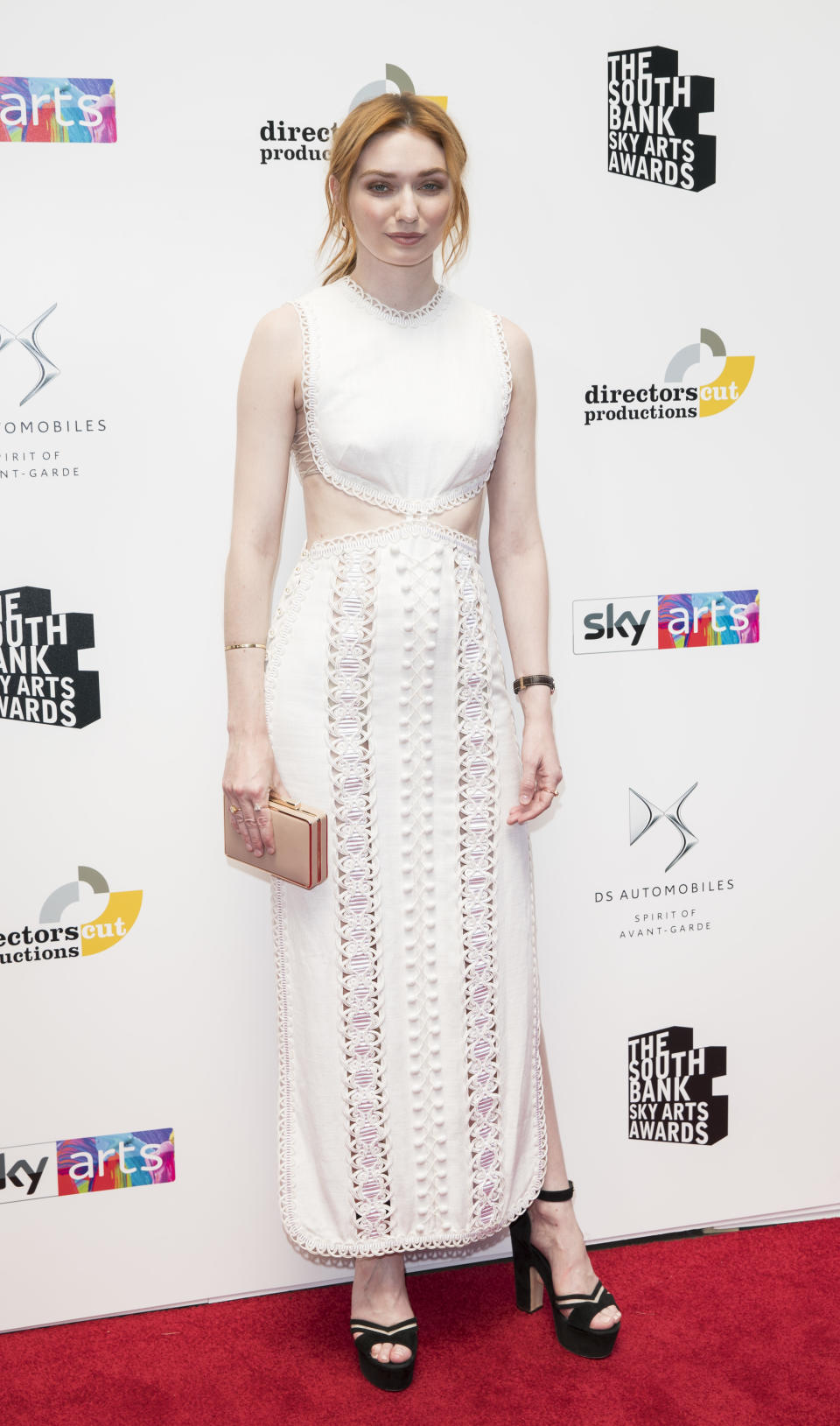 <p>Actress Eleanour Tomlinson arrived at The Southbank Sky Awards on 1 July in a summer-ready lace dress with platforms. <em>[Photo: Getty]</em> </p>