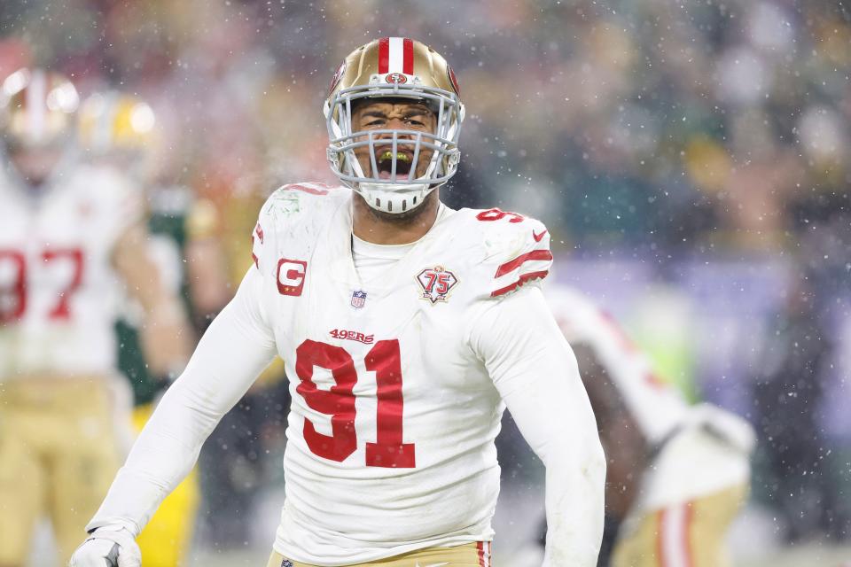 San Francisco 49ers defensive end Arik Armstead celebrates during the second half against the Green Bay Packers at Lambeau Field.