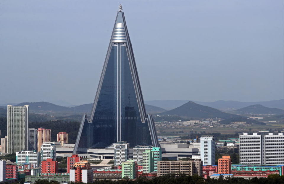 The Ryugyong Hotel skyscraper pictured in Pyongyang against a blue sky. Source: Getty