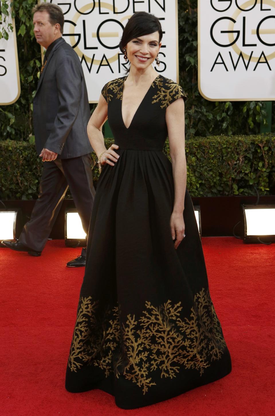 Best: Julianna Margulies always opts for classic and it always works. The gold accents add the perfect amount of pop and did we mention that the dress has pockets? Yeah, it does. REUTERS/Mario Anzuoni