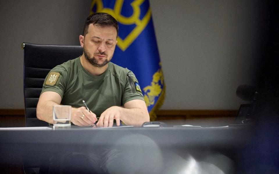 Ukraine's President Volodymyr Zelenskiy attends a working session of G7 leaders via video link, as Russia's attack on Ukraine continues, in Kyiv, Ukraine June 27, 2022.  - krainian Presidential Press Service/Handout via REUTERS