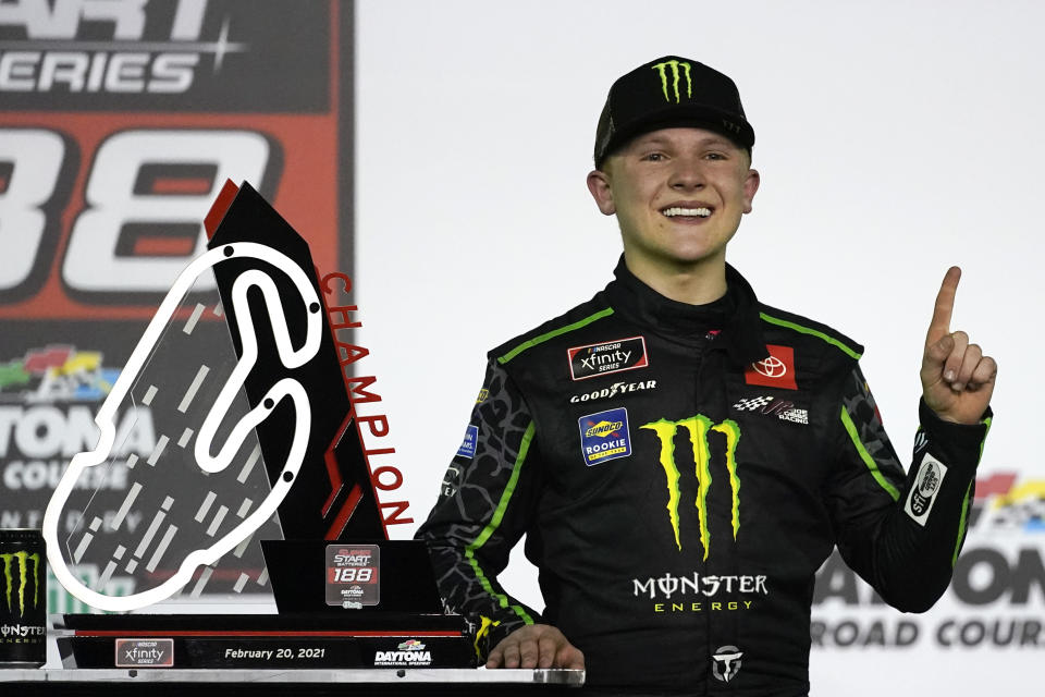 Ty Gibbs celebrates in Victory Lane after winning the NASCAR Xfinity Series road course auto race at Daytona International Speedway, Saturday, Feb. 20, 2021, in Daytona Beach, Fla. (AP Photo/John Raoux)