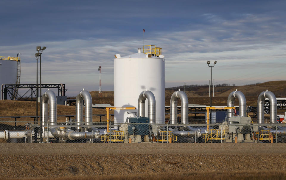 FILE - In this Nov. 6, 2015 file photo, a Keystone pipeline facility sits in Hardisty, Alberta. The Keystone XL is dead after a 12-year attempt to complete the partially built oil pipeline. But the fight over Canadian crude rages on as emboldened environmentalists target other projects and pressure President Joe Biden to intervene. (Jeff McIntosh/The Canadian Press via AP, File)