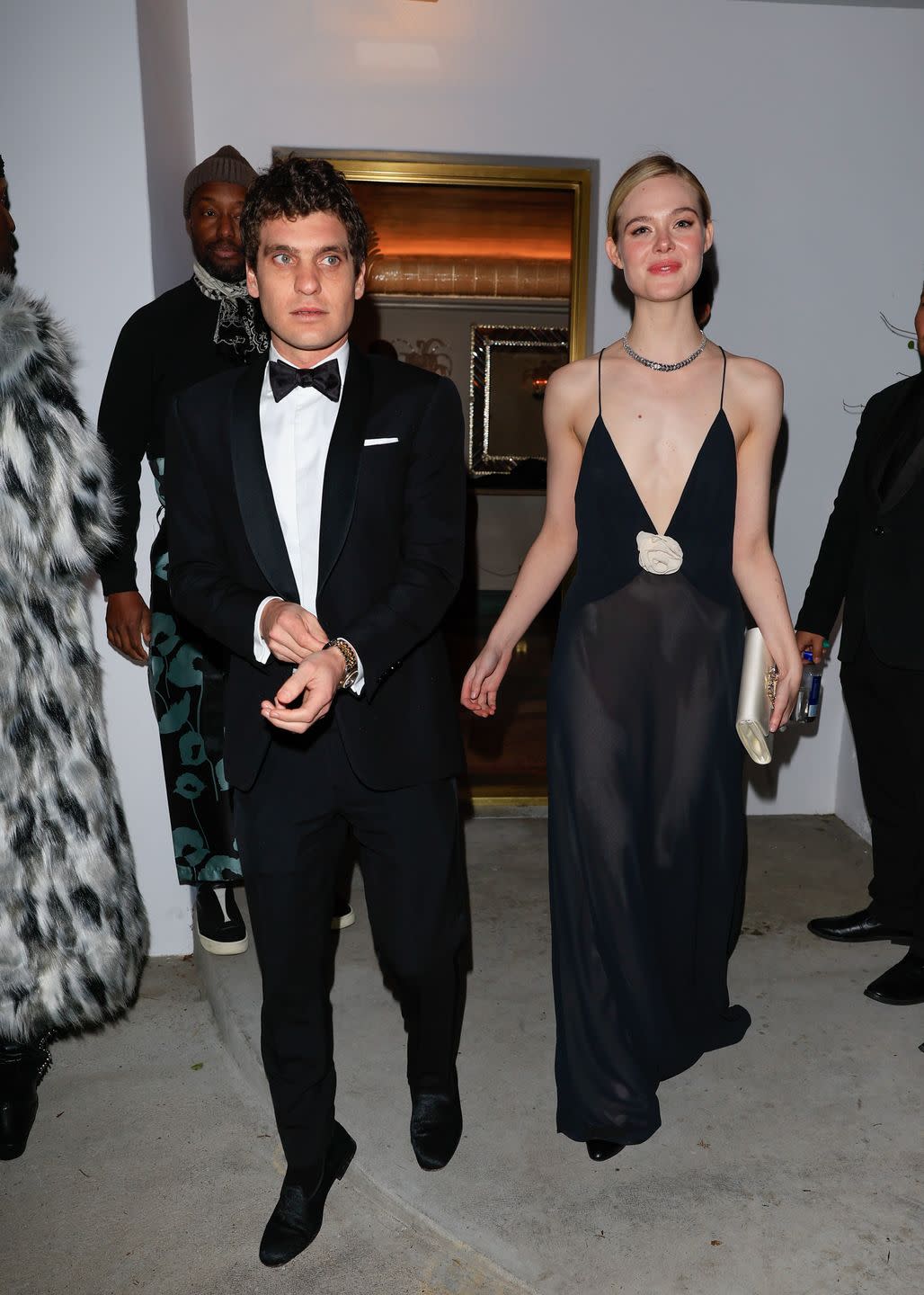 los angeles, ca january 07 gus wenner and elle fanning are seen arriving to vas morgan and michael browns 2024 golden globe awards party on january 07, 2024 in los angeles, california photo by rachpootbauer griffingc images