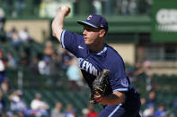 Chicago Cubs starting pitcher Adrian Sampson throws against the Cincinnati Reds during the first inning of a baseball game in Chicago, Friday, Sept. 30, 2022. (AP Photo/Nam Y. Huh)