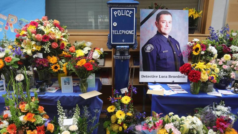 Flowers fill the lobby of the San Luis Obispo Police Department. Det. Luca Benedetti was killed and Det. Steve Orozco was wounded during a warrant search on Camellia Court on Monday, May 10, 2021. The subject of the search, Edward Giron, opened fire on the officers and died from a self-inflicted wound and injuries from the shootout.