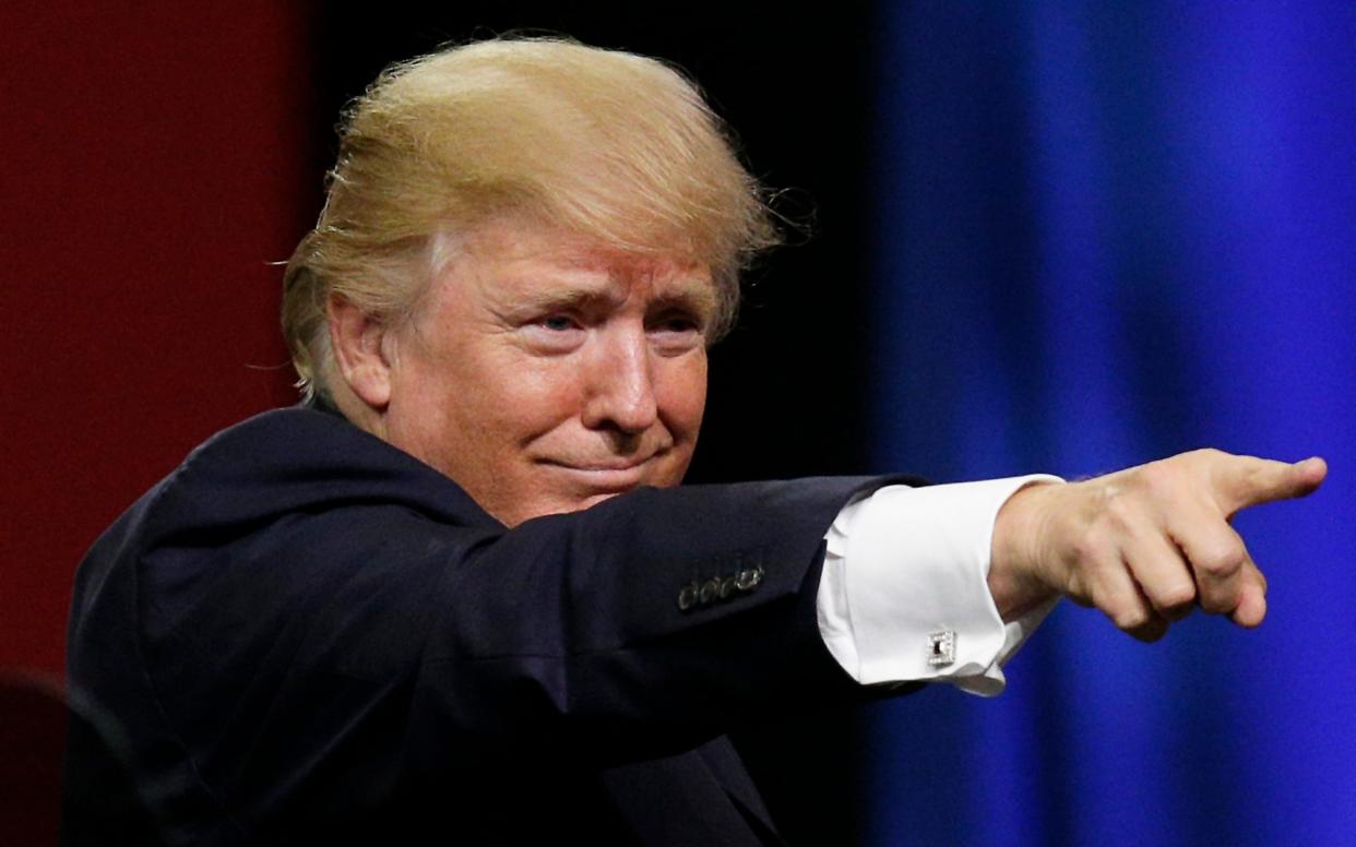 President Donald Trump speaks at a campaign rally in support of Sen. Luther Strange, in Huntsville, Alabama - AP