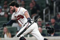 Atlanta Braves' Dansby Swanson runs to first base after hitting a single in the seventh inning of a baseball game against the Philadelphia Phillies, Monday, May 23, 2022, in Atlanta. (AP Photo/John Bazemore)