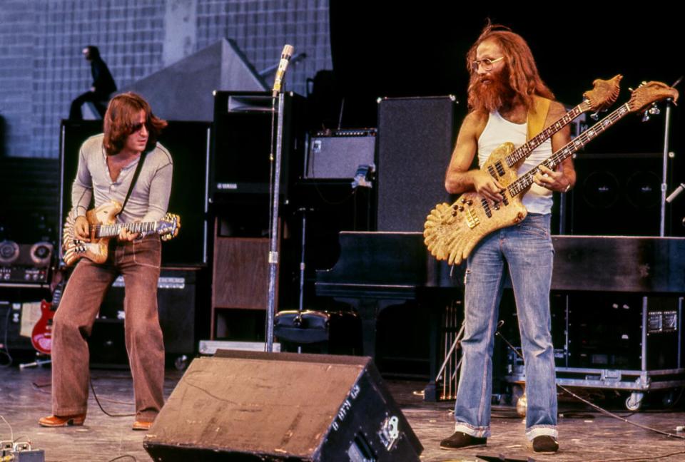 Danny Kortchmar and Leland Sklar perform onstage.